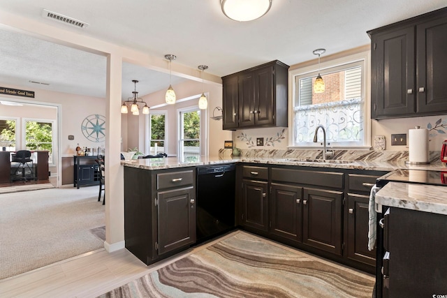 1575 Victoria Ln, Myrtle Beach, SC 29577 - kitchen featuring dishwasher, light stone counters, pendant lighting, and a peninsula