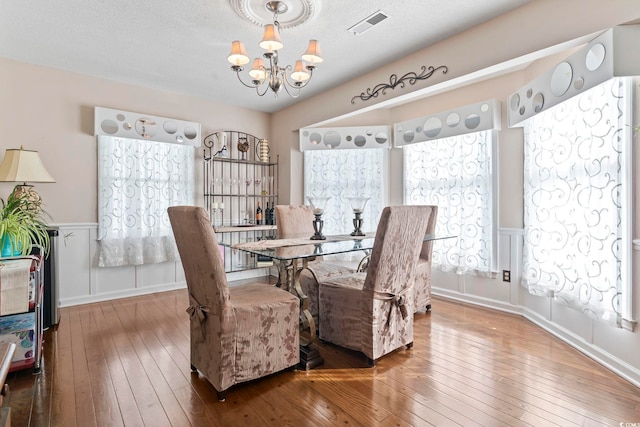 1575 Victoria Ln, Myrtle Beach, SC 29577 - dining room with a chandelier and wood-type flooring