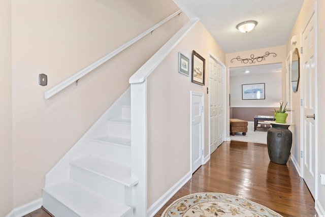 1575 Victoria Ln, Myrtle Beach, SC 29577 - corridor with stairs, wood finished floors, and a textured ceiling