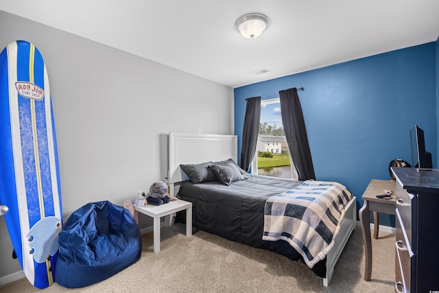 317 Truce St, Myrtle Beach, SC 29588 - carpeted bedroom featuring baseboards