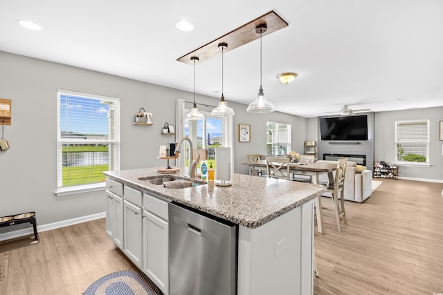 317 Truce St, Myrtle Beach, SC 29588 - kitchen with dishwasher, light wood-type flooring, ceiling fan, decorative light fixtures, and a kitchen island with sink