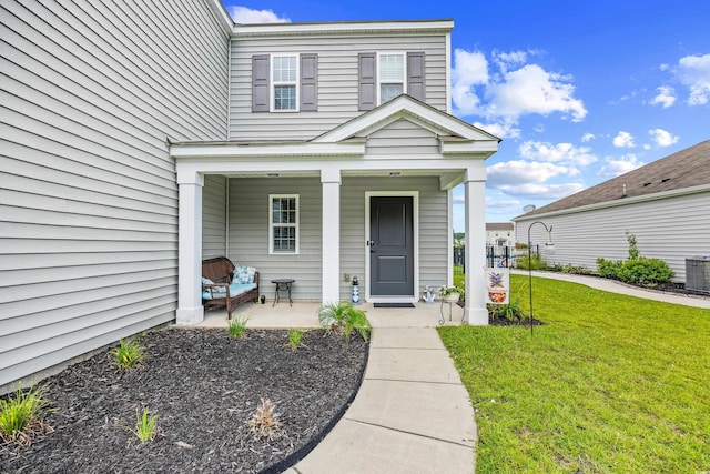 317 Truce St, Myrtle Beach, SC 29588 - property entrance with a yard and a porch