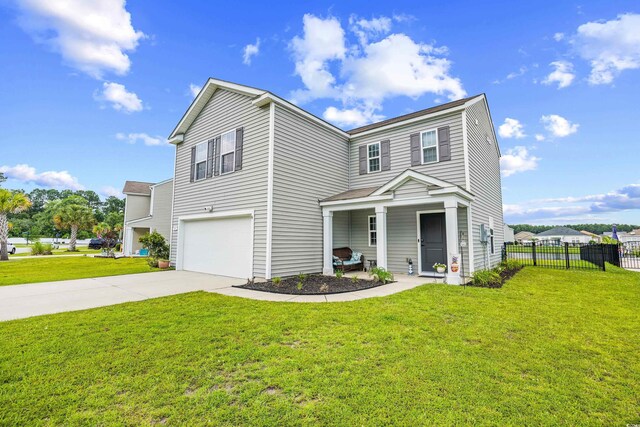 317 Truce St, Myrtle Beach, SC 29588 - traditional-style home featuring driveway, an attached garage, and covered porch