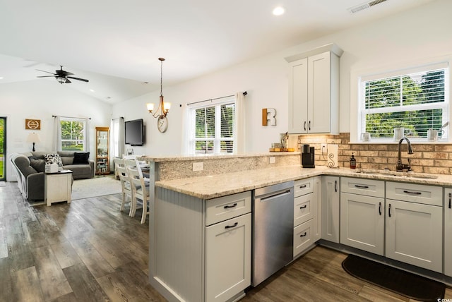 2588 Long Ave, Conway, SC 29526 - kitchen featuring dishwasher, a peninsula, healthy amount of natural light, dark wood-style flooring, and recessed lighting
