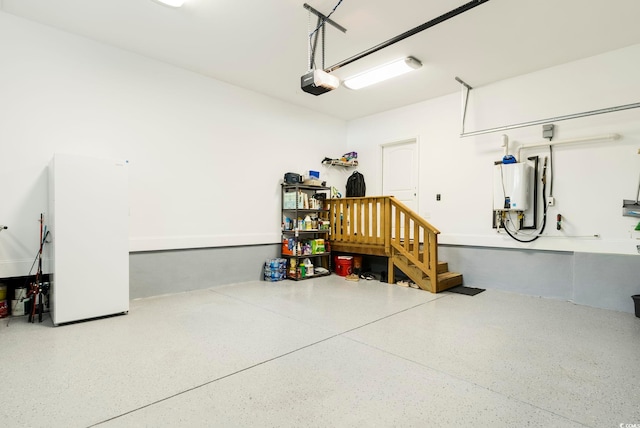 2588 Long Ave, Conway, SC 29526 - garage featuring tankless water heater and a garage door opener