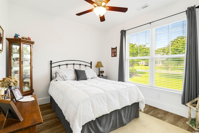 2588 Long Ave, Conway, SC 29526 - bedroom featuring multiple windows, wood finished floors, and a ceiling fan