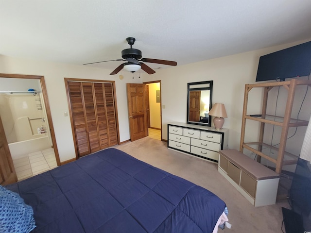 207 Double Eagle Dr Unit E-1, Surfside Beach, SC 29575 - carpeted bedroom featuring a ceiling fan, a closet, and connected bathroom
