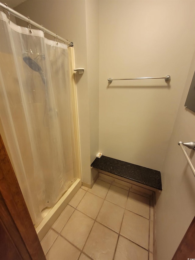 207 Double Eagle Dr Unit E-1, Surfside Beach, SC 29575 - full bathroom featuring tile patterned floors and a stall shower