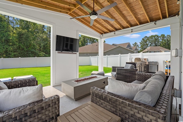 405 Spring View Ct, Little River, SC 29566 - fenced backyard with an outdoor living space with a fire pit, a ceiling fan, and a patio