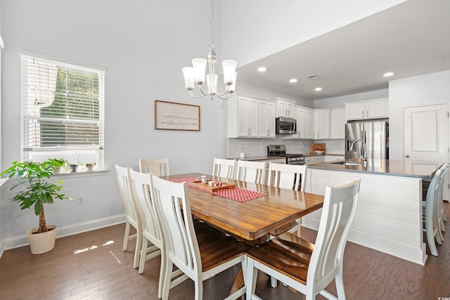 405 Spring View Ct, Little River, SC 29566 - dining room featuring a chandelier, wood finished floors, and recessed lighting