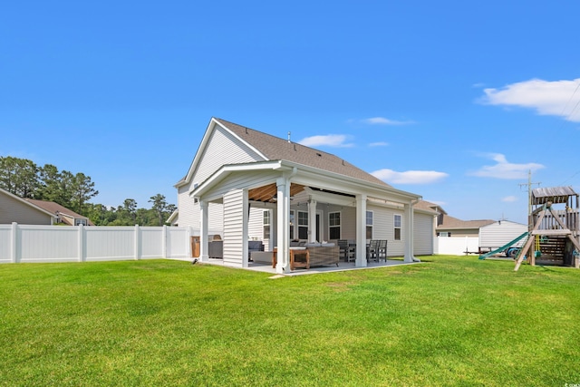 405 Spring View Ct, Little River, SC 29566 - back of property featuring a playground, a patio, outdoor lounge area, a ceiling fan, and a fenced backyard