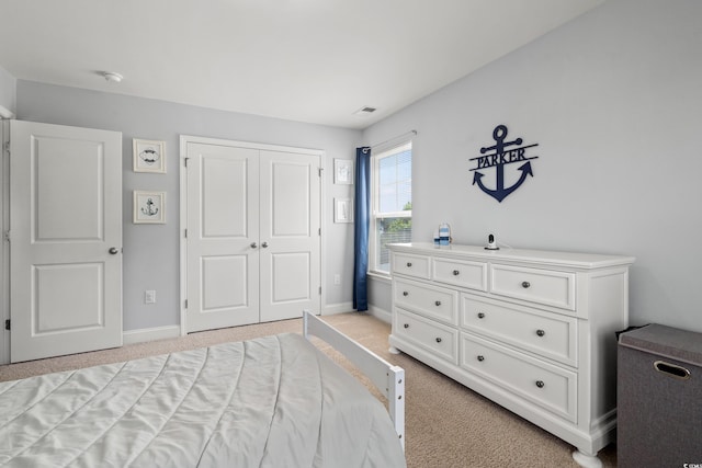405 Spring View Ct, Little River, SC 29566 - bedroom with light carpet and a closet