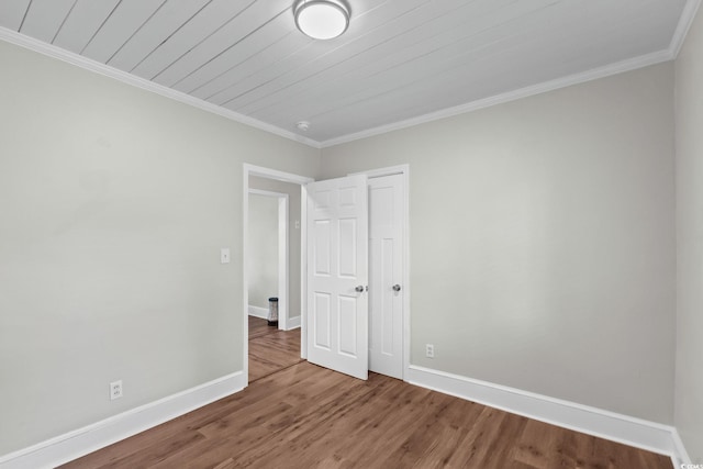 4325 Ellis Ave, Little River, SC 29566 - empty room featuring wood finished floors and ornamental molding