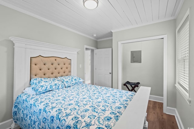 4325 Ellis Ave, Little River, SC 29566 - bedroom with wood finished floors, electric panel, and crown molding