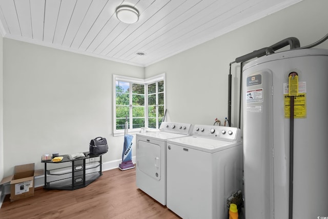 4325 Ellis Ave, Little River, SC 29566 - washroom with separate washer and dryer, water heater, ornamental molding, wooden ceiling, and light wood-style floors