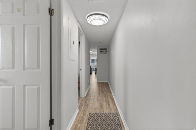 920 N Waccamaw Dr Unit 2310, Murrells Inlet, SC 29576 - hallway with light wood-style floors and baseboards