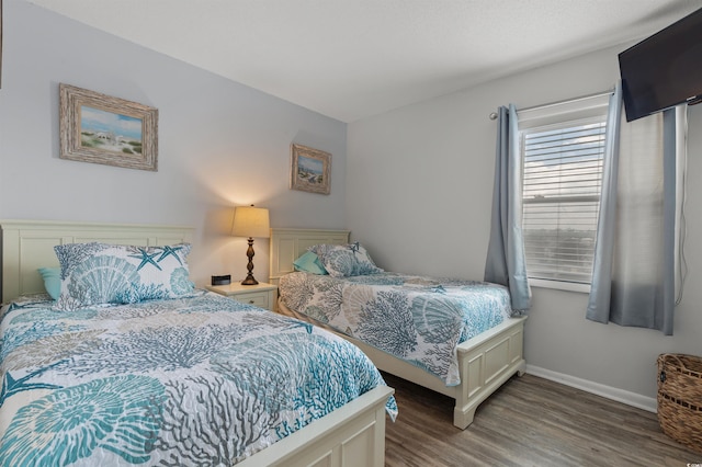 920 N Waccamaw Dr Unit 2310, Murrells Inlet, SC 29576 - bedroom featuring wood finished floors and baseboards