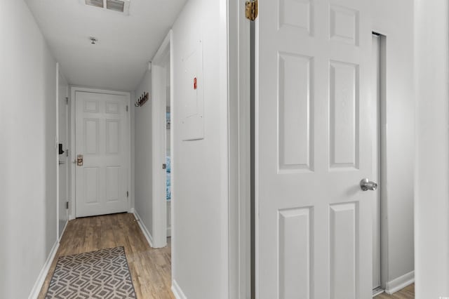 920 N Waccamaw Dr Unit 2310, Murrells Inlet, SC 29576 - corridor featuring light wood-style flooring and baseboards