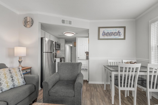 920 N Waccamaw Dr Unit 2310, Murrells Inlet, SC 29576 - living area featuring ornamental molding and dark wood-type flooring
