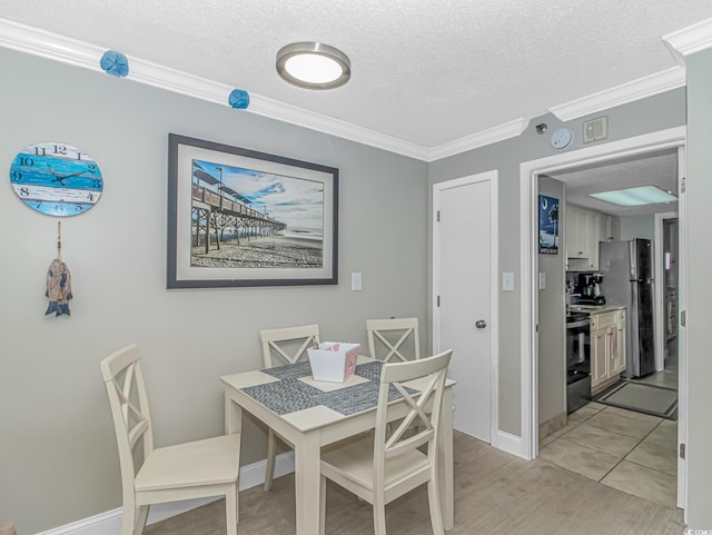 201 S Ocean Blvd Unit 616, Myrtle Beach, SC 29577 - dining room with crown molding, a textured ceiling, and light wood-style floors
