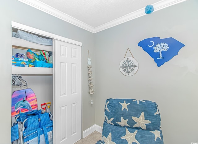 201 S Ocean Blvd Unit 616, Myrtle Beach, SC 29577 - sitting room with crown molding and a textured ceiling