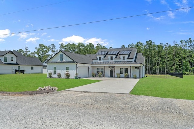 1253 Kenworth Cir, Conway, SC 29526 - modern farmhouse with board and batten siding, driveway, an attached garage, a standing seam roof, and a metal roof
