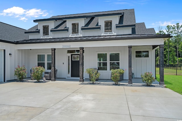 1253 Kenworth Cir, Conway, SC 29526 - modern inspired farmhouse featuring covered porch, a standing seam roof, a shingled roof, and board and batten siding