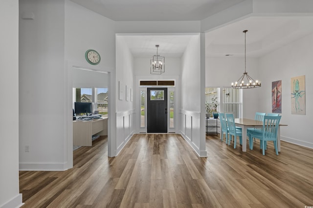 1253 Kenworth Cir, Conway, SC 29526 - foyer entrance featuring a chandelier, wood finished floors, and a towering ceiling