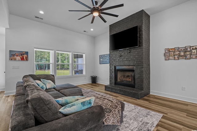 1253 Kenworth Cir, Conway, SC 29526 - living area featuring ceiling fan, a fireplace, wood finished floors, and recessed lighting