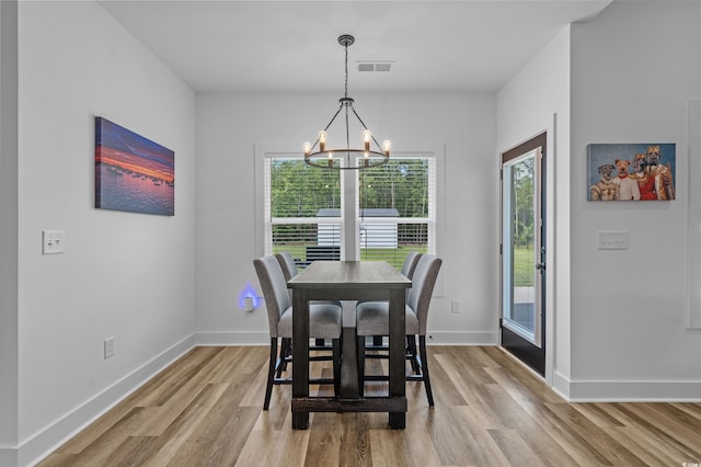 1253 Kenworth Cir, Conway, SC 29526 - dining room with wood finished floors and a chandelier