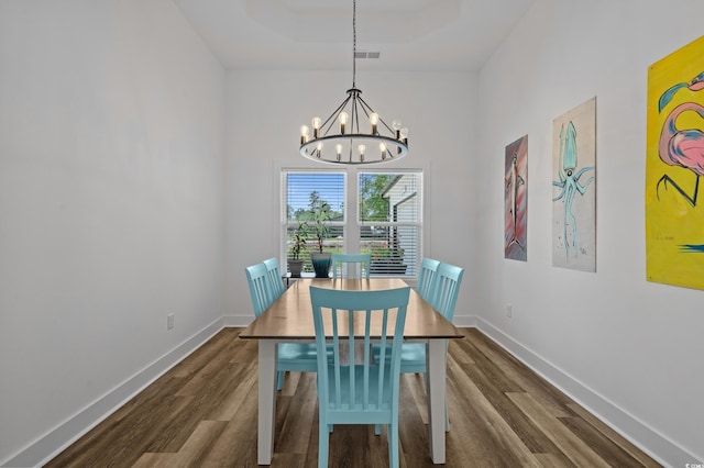 1253 Kenworth Cir, Conway, SC 29526 - dining area featuring a chandelier, dark wood-type flooring, and a high ceiling