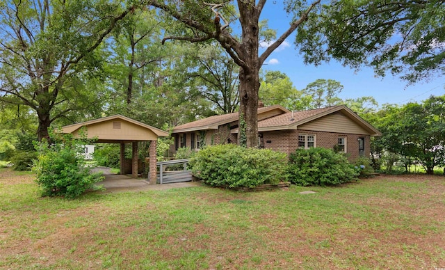 1272 Park Hill Dr, Conway, SC 29526 - rear view of property featuring brick siding and a yard
