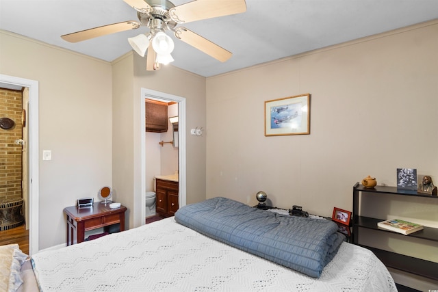 1272 Park Hill Dr, Conway, SC 29526 - bedroom with connected bathroom, ceiling fan, and brick wall