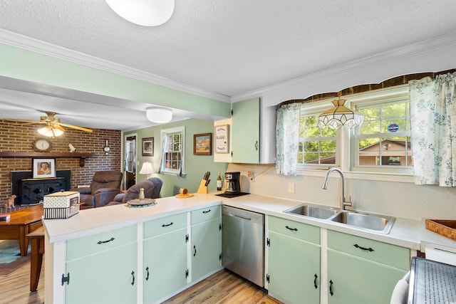 1272 Park Hill Dr, Conway, SC 29526 - kitchen with stainless steel dishwasher, a peninsula, open floor plan, light wood-type flooring, and light countertops