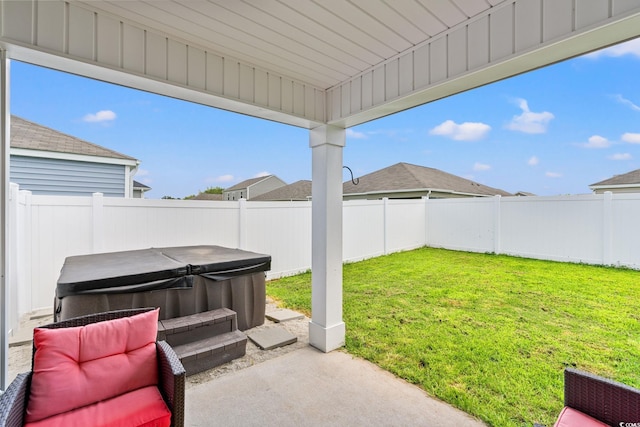 821 Twickenham Loop, Longs, SC 29568 - fenced backyard with a hot tub and a patio