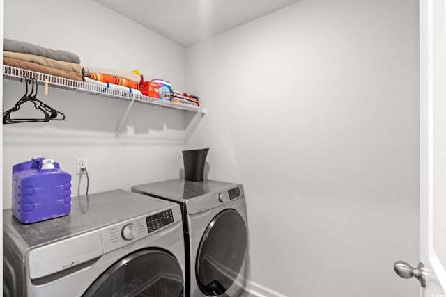 821 Twickenham Loop, Longs, SC 29568 - laundry room featuring washing machine and clothes dryer and baseboards