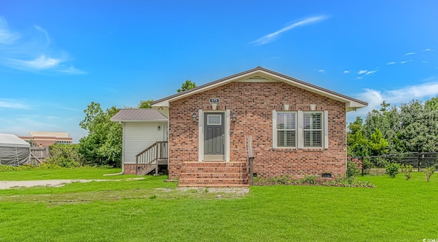 175 Cypress Ln, Little River, SC 29566 - rear view of house with brick siding, entry steps, and crawl space