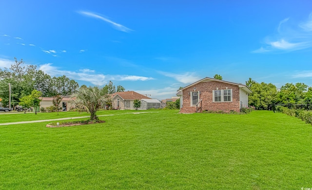 175 Cypress Ln, Little River, SC 29566 - view of green lawn