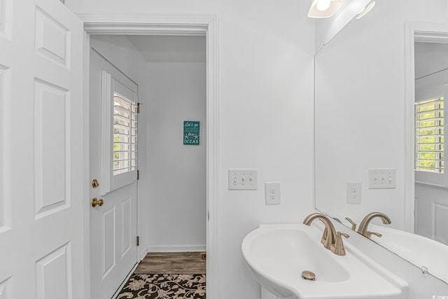175 Cypress Ln, Little River, SC 29566 - bathroom featuring a sink and wood finished floors
