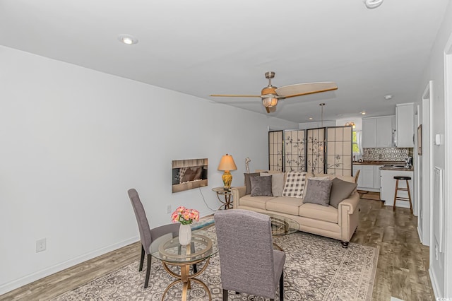 175 Cypress Ln, Little River, SC 29566 - living area featuring light wood finished floors, ceiling fan, and recessed lighting