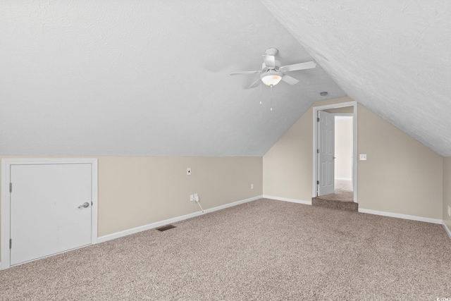 5008 Hayes Bay Ct, Murrells Inlet, SC 29576 - bonus room with carpet flooring, lofted ceiling, a ceiling fan, and a textured ceiling