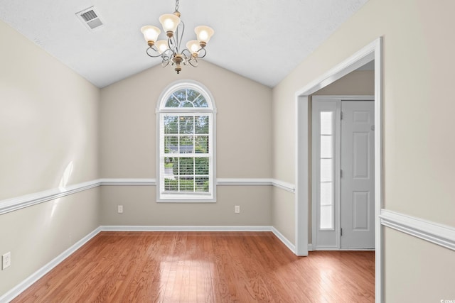 5008 Hayes Bay Ct, Murrells Inlet, SC 29576 - foyer with a chandelier, wood finished floors, and lofted ceiling