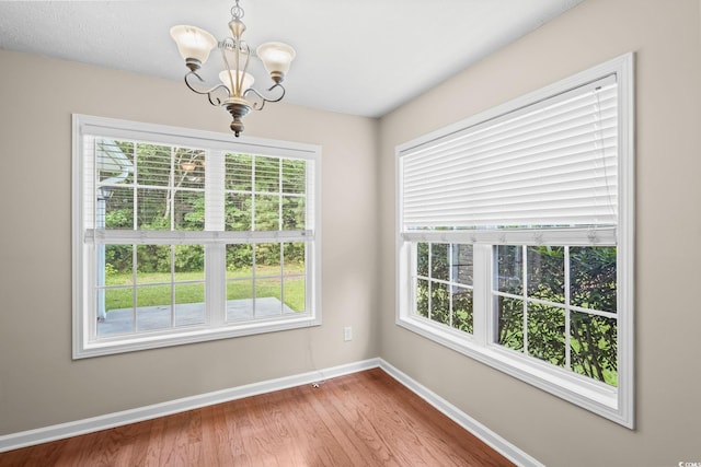 5008 Hayes Bay Ct, Murrells Inlet, SC 29576 - unfurnished dining area featuring a chandelier and wood finished floors