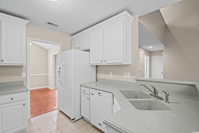 5008 Hayes Bay Ct, Murrells Inlet, SC 29576 - kitchen featuring white appliances, white cabinets, and light tile patterned flooring