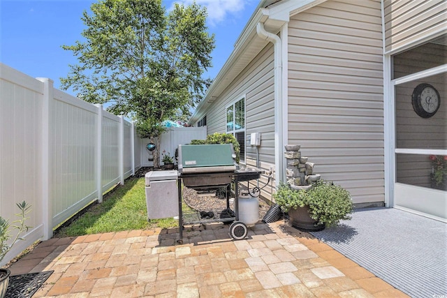 800 Monarch Dr Unit 49, Myrtle Beach, SC 29588 - fenced backyard with a patio and a grill