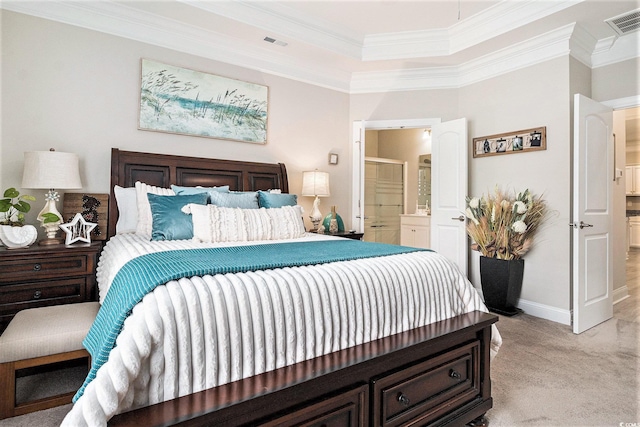 800 Monarch Dr Unit 49, Myrtle Beach, SC 29588 - bedroom with crown molding, light colored carpet, connected bathroom, and a tray ceiling