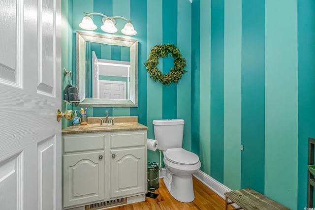 1176 Old Plantation Dr, Pawleys Island, SC 29585 - half bath featuring vanity and wood finished floors