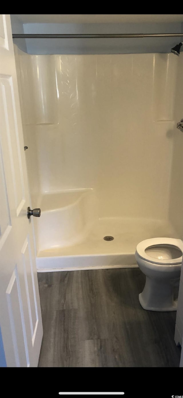 1101 2nd Ave N Unit 306, Surfside Beach, SC 29575 - bathroom with a shower and wood finished floors