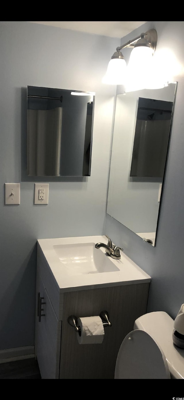 1101 2nd Ave N Unit 306, Surfside Beach, SC 29575 - bathroom with vanity and toilet