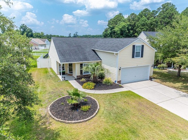 805 Cherry Bark Ct, Myrtle Beach, SC 29579 - traditional home featuring roof with shingles, concrete driveway, a garage, and a porch